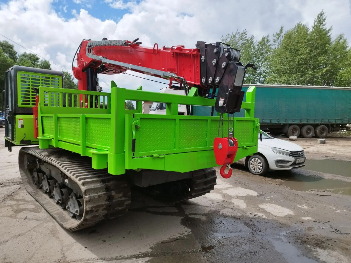 Бурильно-крановая установка TAURUS 035A на базе гусеничного форвардера Бурильно-крановая установка TAURUS 035A на базе гусеничного форвардера